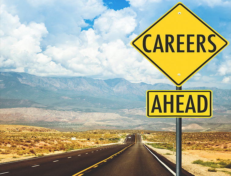 Image of yellow sign along desert road that reads "Careers Ahead"
